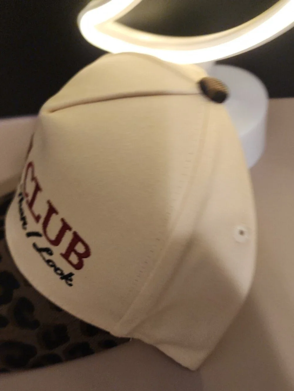 Cream and Leopard Print Baseball Cap with Embroidered Slogan